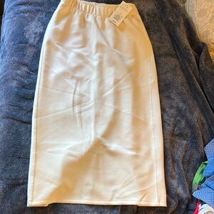 Elegant White long Skirt with slit in back.